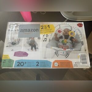 Baby Einstein 2 in 1 rocker NEW